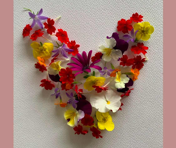 Heart made with fresh flowers