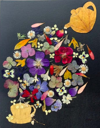 Pouring pressed flowers tea in a cup